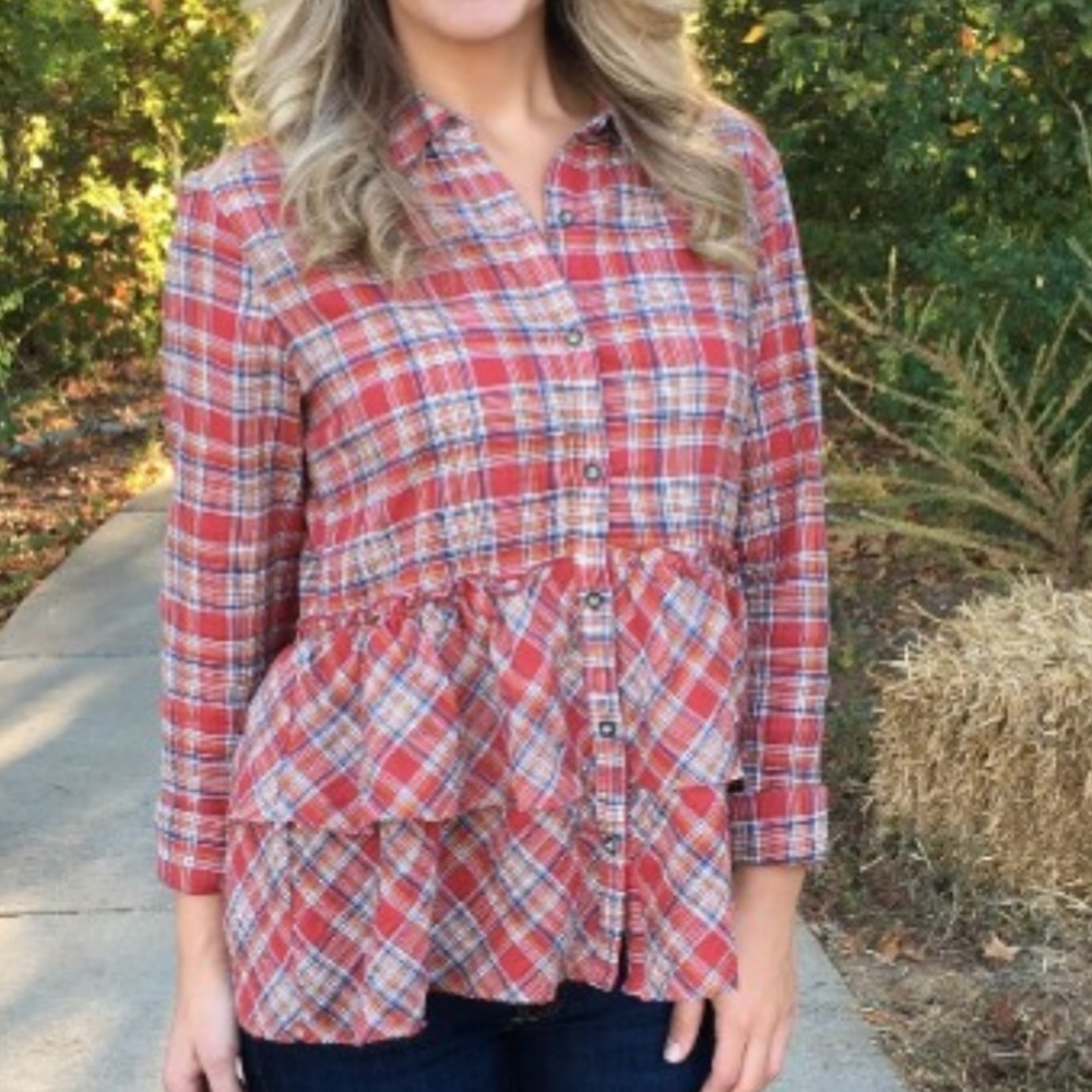 Flannel button up top with ruffles. Size small